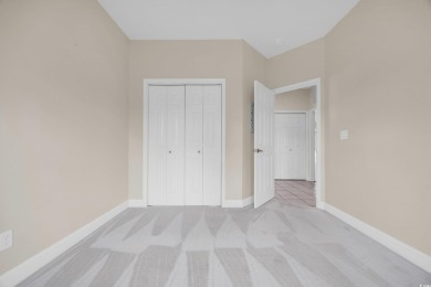 Located on a cul-de-sac in The Commons, this 3-bedroom on Burning Ridge Golf Course in South Carolina - for sale on GolfHomes.com, golf home, golf lot