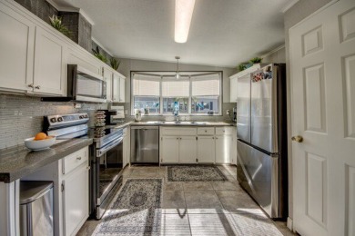 If you're looking for a home with a breathtaking view, this is on Pine Lakes Country Club in Florida - for sale on GolfHomes.com, golf home, golf lot