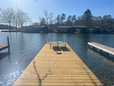 Walk outside your sliding back patio onto Lake DeSoto! This home on DeSoto Golf Course in Arkansas - for sale on GolfHomes.com, golf home, golf lot