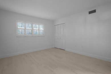 Beautiful 1 st floor golf course condo in the City of Atlantis on  in Florida - for sale on GolfHomes.com, golf home, golf lot