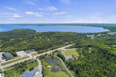 10.3 acres approved for 9 four-plex condominiums consisting of on Charlevoix Golf and Country Club in Michigan - for sale on GolfHomes.com, golf home, golf lot