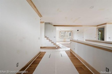 Discover a rare opportunity to own a custom-built residence on Birmingham Country Club in Michigan - for sale on GolfHomes.com, golf home, golf lot