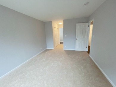 This updated ground-floor end-unit condo in Mallard Cove offers on Arlington Lakes Golf Club in Illinois - for sale on GolfHomes.com, golf home, golf lot