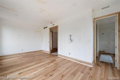 Discover a rare opportunity to own a custom-built residence on Birmingham Country Club in Michigan - for sale on GolfHomes.com, golf home, golf lot