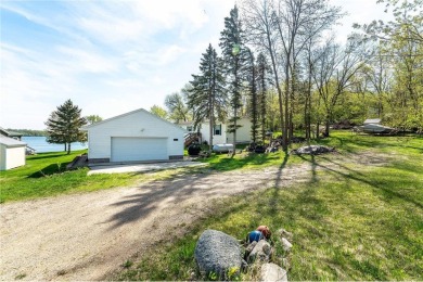 Enjoy lakeside living at its finest on beautiful Stalker Lake in on Stalker Lake Golf Course in Minnesota - for sale on GolfHomes.com, golf home, golf lot