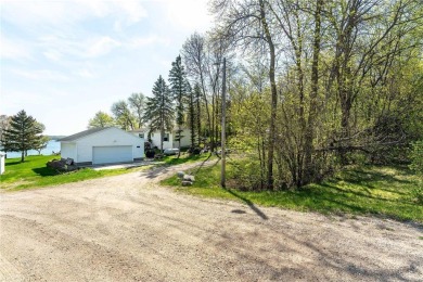 Enjoy lakeside living at its finest on beautiful Stalker Lake in on Stalker Lake Golf Course in Minnesota - for sale on GolfHomes.com, golf home, golf lot