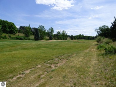 Lovely golf course lot overlooking the 6th fairway of the Summit on Shanty Creek Golf Course in Michigan - for sale on GolfHomes.com, golf home, golf lot