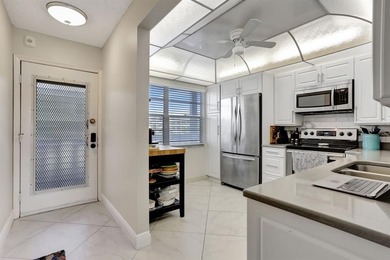 Stunning, spacious, furnished 2-bedroom, 2-bath  in the vibrant on Wynmoor Golf Course in Florida - for sale on GolfHomes.com, golf home, golf lot