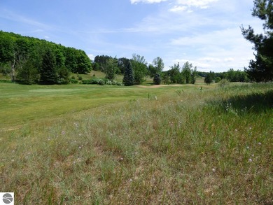 Lovely golf course lot overlooking the 6th fairway of the Summit on Shanty Creek Golf Course in Michigan - for sale on GolfHomes.com, golf home, golf lot