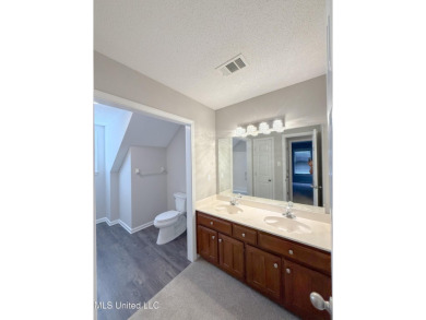 This adorable home is located in the beautiful neighborhood of on Wedgewood Golfers Club in Mississippi - for sale on GolfHomes.com, golf home, golf lot