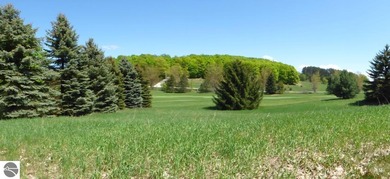 Lovely golf course lot overlooking the 6th fairway of the Summit on Shanty Creek Golf Course in Michigan - for sale on GolfHomes.com, golf home, golf lot