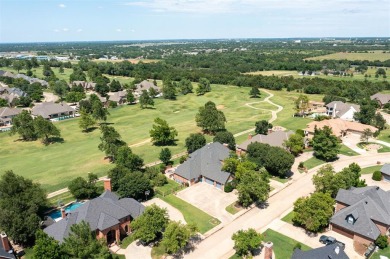 Welcome to your dream home in the prestigious Oak Tree on Oak Tree National Golf and Country Club in Oklahoma - for sale on GolfHomes.com, golf home, golf lot