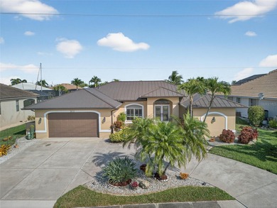 PRIME WATERFRONT IN PUNTA GORDA ISLES! BEAUTIFULL 3 BEDROOM, 2 on Saint Andrews South Golf Club in Florida - for sale on GolfHomes.com, golf home, golf lot