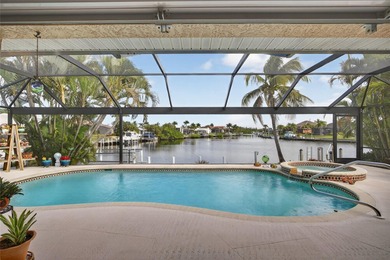 PRIME WATERFRONT IN PUNTA GORDA ISLES! BEAUTIFULL 3 BEDROOM, 2 on Saint Andrews South Golf Club in Florida - for sale on GolfHomes.com, golf home, golf lot