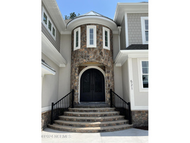 Welcome to your Castle at the Beach! This 4-bedroom 4-bath on Ocean Ridge Plantation in North Carolina - for sale on GolfHomes.com, golf home, golf lot