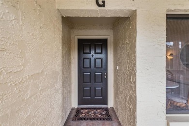 This delightful 2nd Floor Condo located in desirable El Pasado on Tarpon Woods Golf Club in Florida - for sale on GolfHomes.com, golf home, golf lot