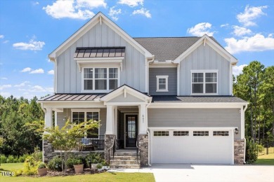 Step into this beautifully crafted, 5BR/4BA gem, ideal for on The Preserve At Jordan Lake Golf Club in North Carolina - for sale on GolfHomes.com, golf home, golf lot