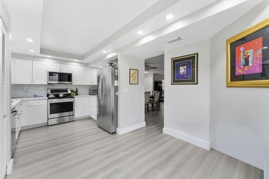 Beautifully renovated with all high-end finishes in the kitchen on  in Florida - for sale on GolfHomes.com, golf home, golf lot