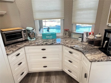 Experience the perfect blend of space, sophistication, and on Pinemoor West Golf Club in Florida - for sale on GolfHomes.com, golf home, golf lot