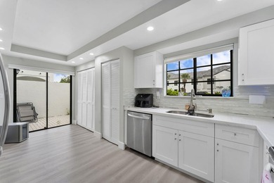 Beautifully renovated with all high-end finishes in the kitchen on  in Florida - for sale on GolfHomes.com, golf home, golf lot