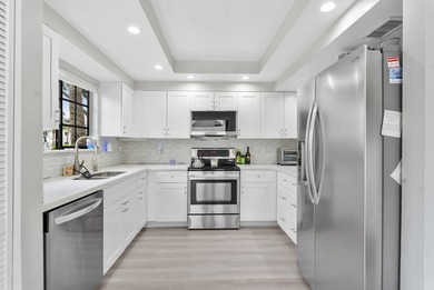 Beautifully renovated with all high-end finishes in the kitchen on  in Florida - for sale on GolfHomes.com, golf home, golf lot