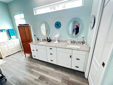 Experience the perfect blend of space, sophistication, and on Pinemoor West Golf Club in Florida - for sale on GolfHomes.com, golf home, golf lot