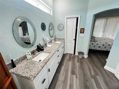 Experience the perfect blend of space, sophistication, and on Pinemoor West Golf Club in Florida - for sale on GolfHomes.com, golf home, golf lot