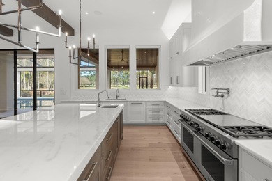 **NEW CONSTRUCTION** Some homes impress. Others make you slow on Sandestin Golf and Beach Resort - Raven in Florida - for sale on GolfHomes.com, golf home, golf lot