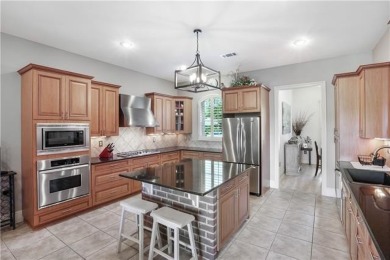 Welcome to 100 Chacahoula Lane, a classic French-style on Beau Chene Country Club in Louisiana - for sale on GolfHomes.com, golf home, golf lot