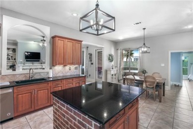 Welcome to 100 Chacahoula Lane, a classic French-style on Beau Chene Country Club in Louisiana - for sale on GolfHomes.com, golf home, golf lot