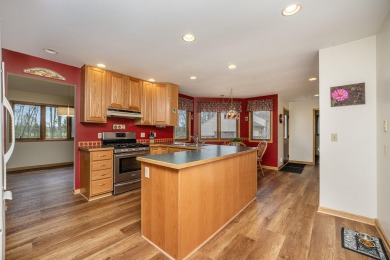 Beautifully updated contemporary ranch offering 3 possible 4 on Ridgeview Golf Course in Michigan - for sale on GolfHomes.com, golf home, golf lot