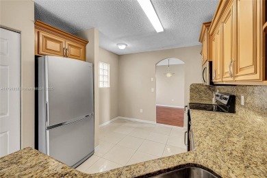 Discover elegance in this exquisite 4-bed/2.5-bath home in on Grand Palms Hotel and Golf Resort in Florida - for sale on GolfHomes.com, golf home, golf lot