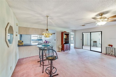 Welcome to the perfect blend of beauty and convenience in this on Falcon Watch Golf Club in Florida - for sale on GolfHomes.com, golf home, golf lot