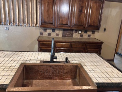 This 3 bedroom, 2 bath home is move-in ready and perfectly on Idabel Country Club in Oklahoma - for sale on GolfHomes.com, golf home, golf lot