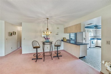 Welcome to the perfect blend of beauty and convenience in this on Falcon Watch Golf Club in Florida - for sale on GolfHomes.com, golf home, golf lot