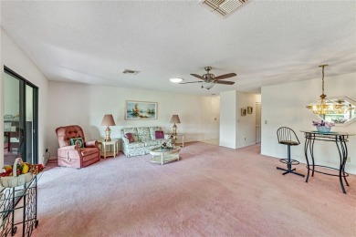 Welcome to the perfect blend of beauty and convenience in this on Falcon Watch Golf Club in Florida - for sale on GolfHomes.com, golf home, golf lot