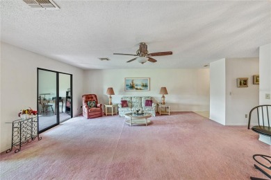 Welcome to the perfect blend of beauty and convenience in this on Falcon Watch Golf Club in Florida - for sale on GolfHomes.com, golf home, golf lot