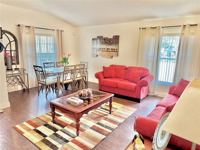 DON'T MISS THIS 4 BEDROMED 3 1/2 BATH ( 2 EN-SUITE ) WITH HEATED on Remington Golf Club in Florida - for sale on GolfHomes.com, golf home, golf lot