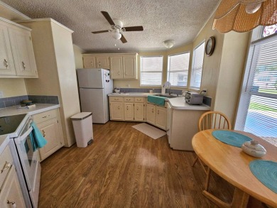 This home is on leased land which means buyers do not own the on Big Cypress Golf and Country Club in Florida - for sale on GolfHomes.com, golf home, golf lot
