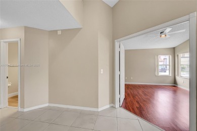 Discover elegance in this exquisite 4-bed/2.5-bath home in on Grand Palms Hotel and Golf Resort in Florida - for sale on GolfHomes.com, golf home, golf lot