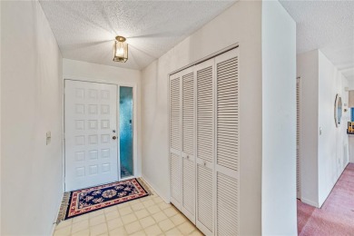 Welcome to the perfect blend of beauty and convenience in this on Falcon Watch Golf Club in Florida - for sale on GolfHomes.com, golf home, golf lot