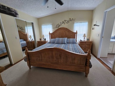 This home is on leased land which means buyers do not own the on Big Cypress Golf and Country Club in Florida - for sale on GolfHomes.com, golf home, golf lot