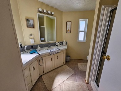 This home is on leased land which means buyers do not own the on Big Cypress Golf and Country Club in Florida - for sale on GolfHomes.com, golf home, golf lot