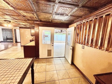 This 3 bedroom, 2 bath home is move-in ready and perfectly on Idabel Country Club in Oklahoma - for sale on GolfHomes.com, golf home, golf lot