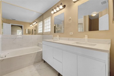 Discover elegance in this exquisite 4-bed/2.5-bath home in on Grand Palms Hotel and Golf Resort in Florida - for sale on GolfHomes.com, golf home, golf lot