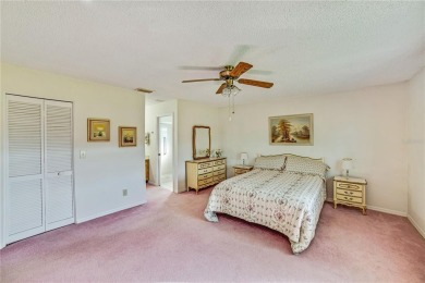 Welcome to the perfect blend of beauty and convenience in this on Falcon Watch Golf Club in Florida - for sale on GolfHomes.com, golf home, golf lot
