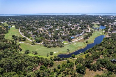 Discover an extraordinary opportunity to create your Florida on St. Petersburg Country Club in Florida - for sale on GolfHomes.com, golf home, golf lot