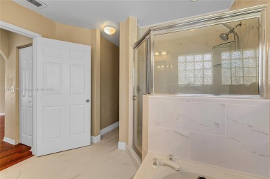 Discover elegance in this exquisite 4-bed/2.5-bath home in on Grand Palms Hotel and Golf Resort in Florida - for sale on GolfHomes.com, golf home, golf lot