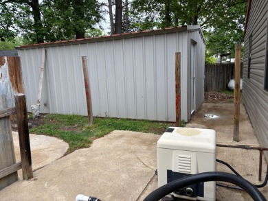 This 3 bedroom, 2 bath home is move-in ready and perfectly on Idabel Country Club in Oklahoma - for sale on GolfHomes.com, golf home, golf lot