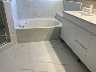 Discover elegance in this exquisite 4-bed/2.5-bath home in on Grand Palms Hotel and Golf Resort in Florida - for sale on GolfHomes.com, golf home, golf lot